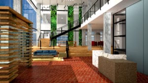 A large lobby with stairs and a couch.